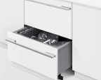 Built in outdoor kitchen dishwasher drawer. Outdoor kitchens designed and fitted by Krieder in the UK and Europe.